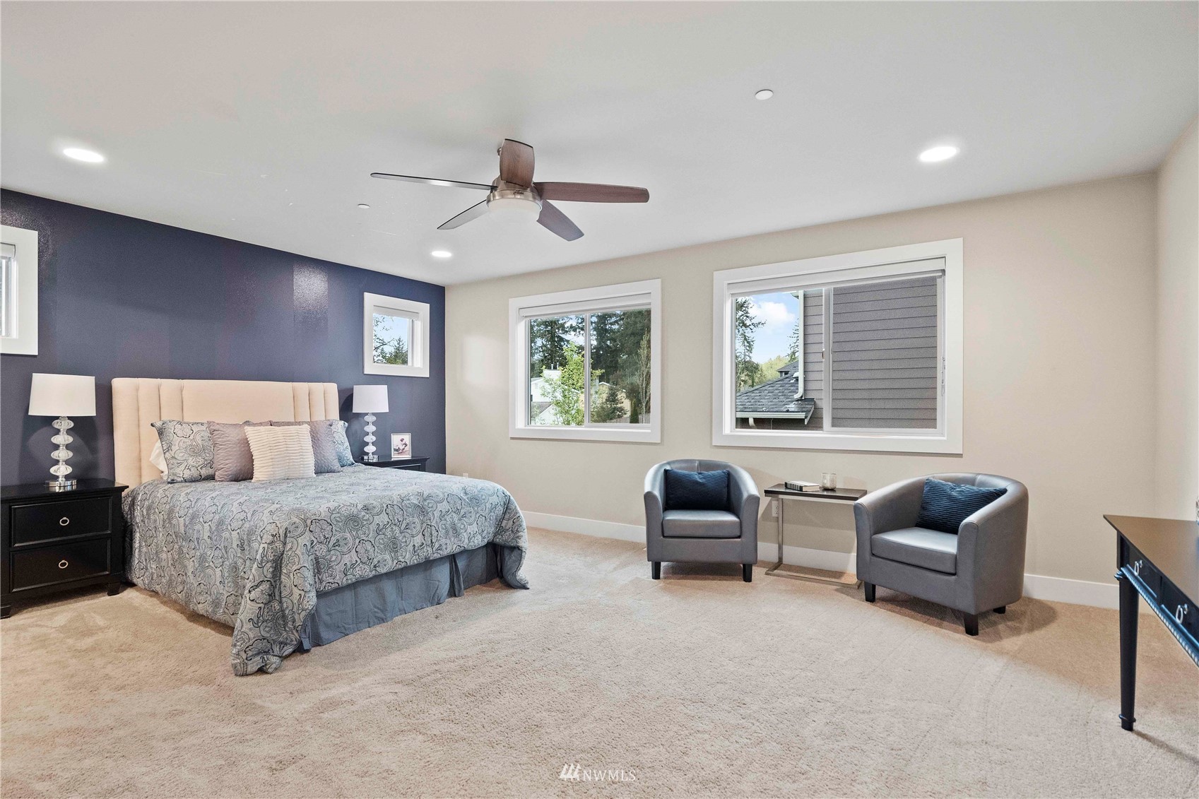 24212 23rd Avenue West Bothell, WA 98021 - Photo 32 of 40 a living room with a bed furniture and a window