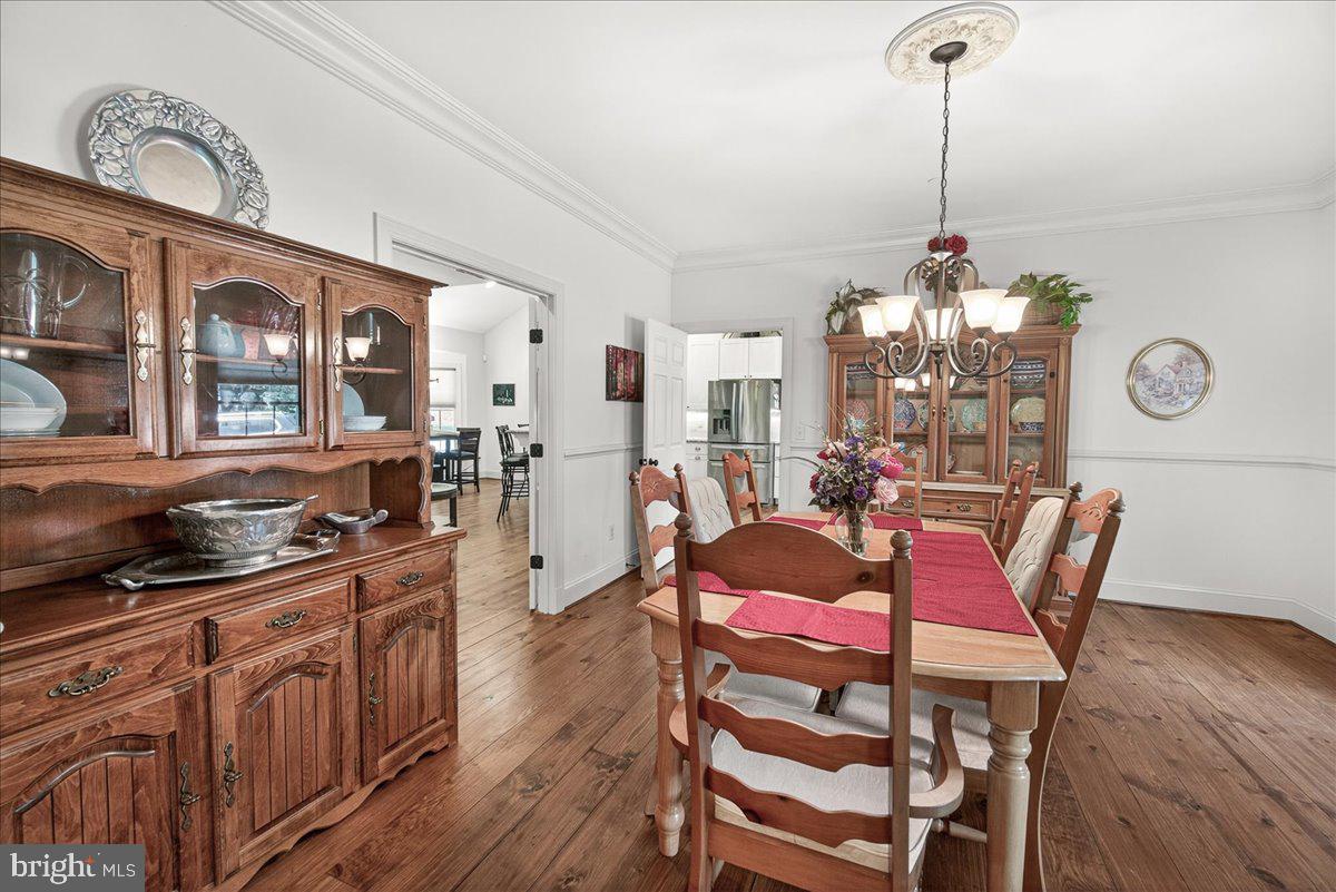 2516 Daisy Road Woodbine, MD 21797 - Photo 30 of 78 Charming dining space with rustic elegance.
