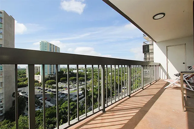 a view of a balcony with an ocean view