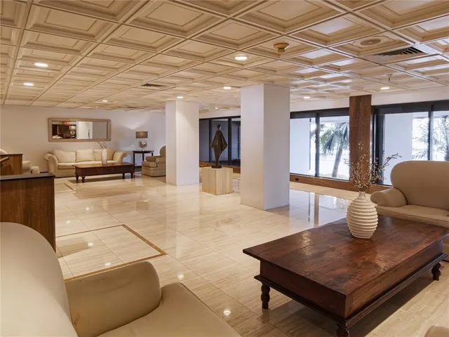an open kitchen with dining table and chairs