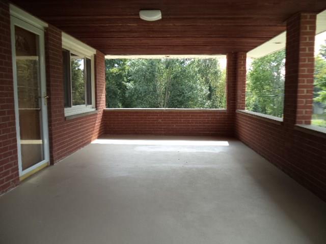 33 Darlington Road Beaver Falls, PA 15010 - Photo 8 of 17 21' x 11' covered side porch, great place to entertain or enjoy a relaxing evening.