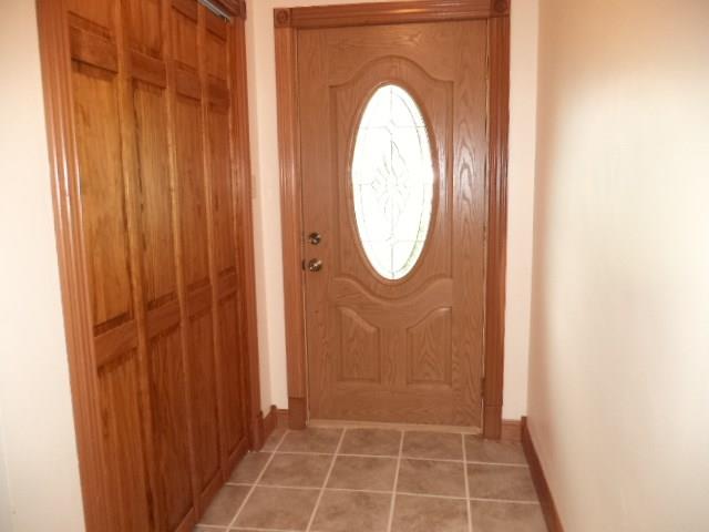 33 Darlington Road Beaver Falls, PA 15010 - Photo 9 of 17 Front Entry with coat closet and brand new ceramic tile flooring !!