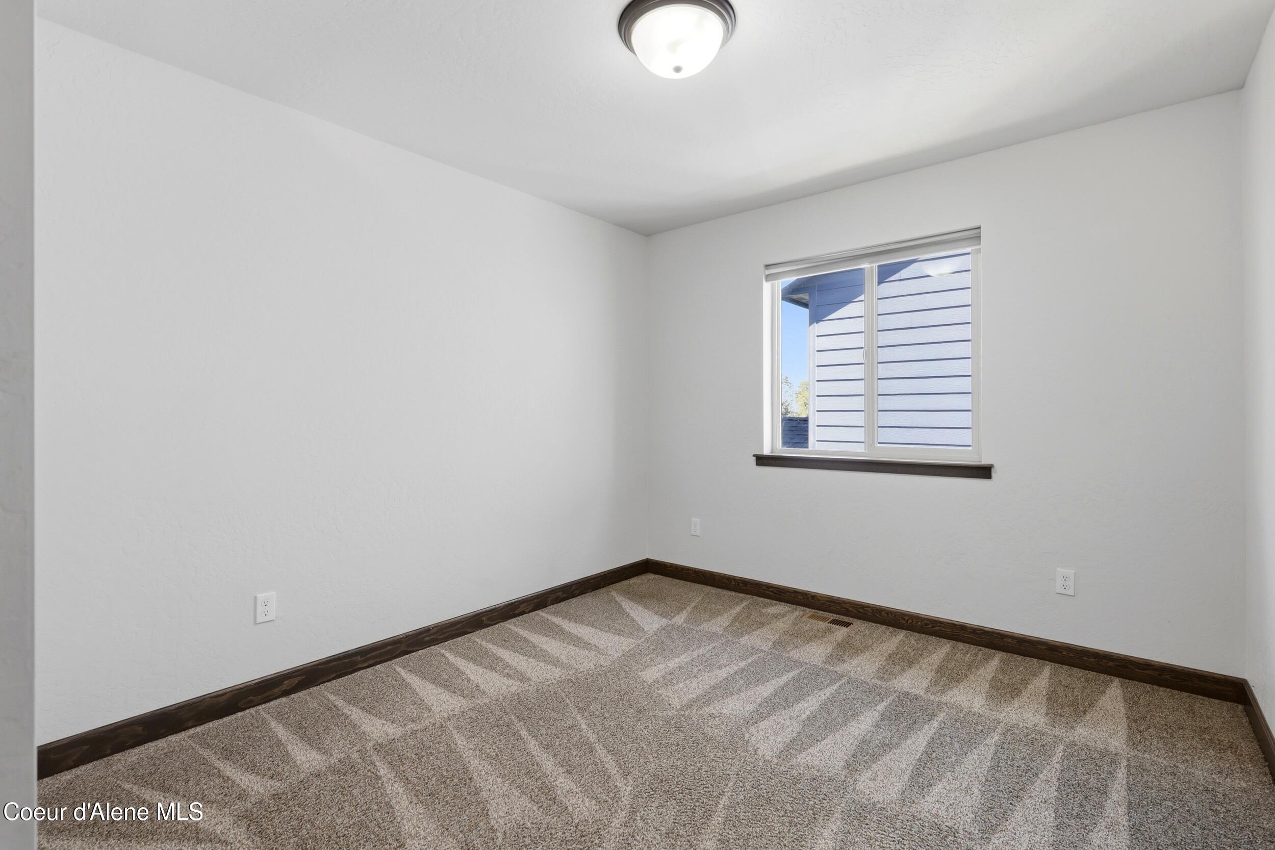 6643 North Gavin Loop Coeur D'Alene, ID 83815 - Photo 19 of 30 Upstairs Bedroom 2