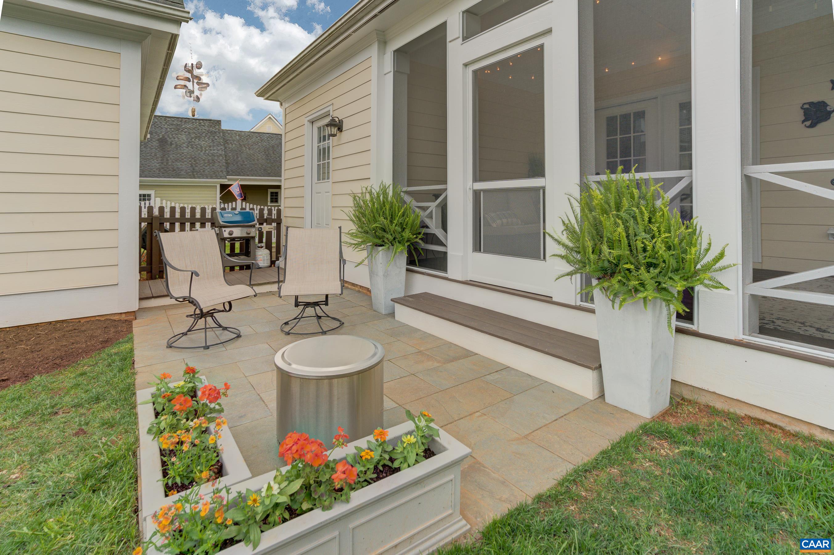 5129 Brook View Road Crozet, VA 22932 - Photo 54 of 71 a view of a chairs and table in a yard