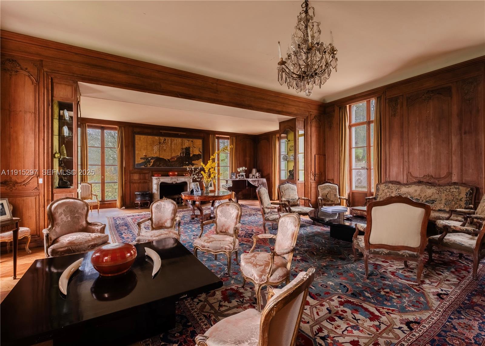 53 Rte De Saint-Germain El Indio, IDF 78860 - Photo 4 of 14 a living room with furniture and a large window