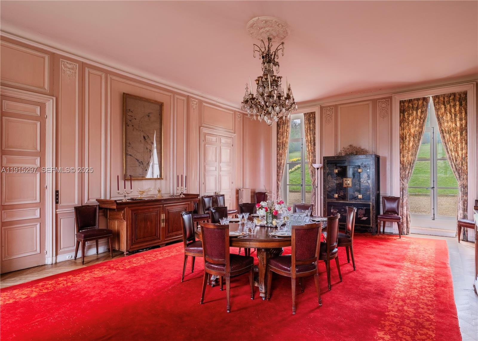 53 Rte De Saint-Germain El Indio, IDF 78860 - Photo 7 of 14 a view of a dining room with furniture and chandelier
