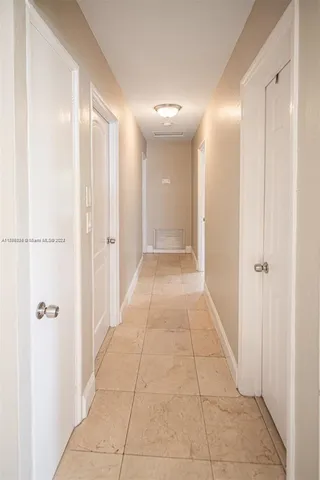 a bathroom with a sink double vanity and a mirror