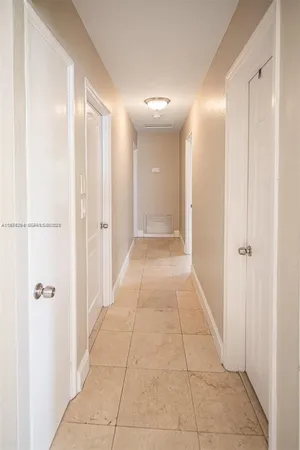 a bathroom with a sink double vanity and a mirror