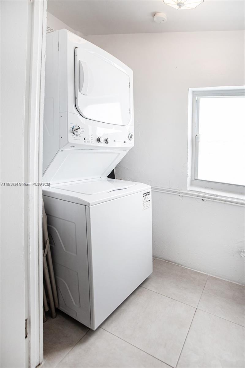 1531 Moffett Street Hollywood, FL 33020 - Photo 26 of 34 a utility room with dryer and washer