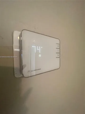 a room with a sink and a mirror