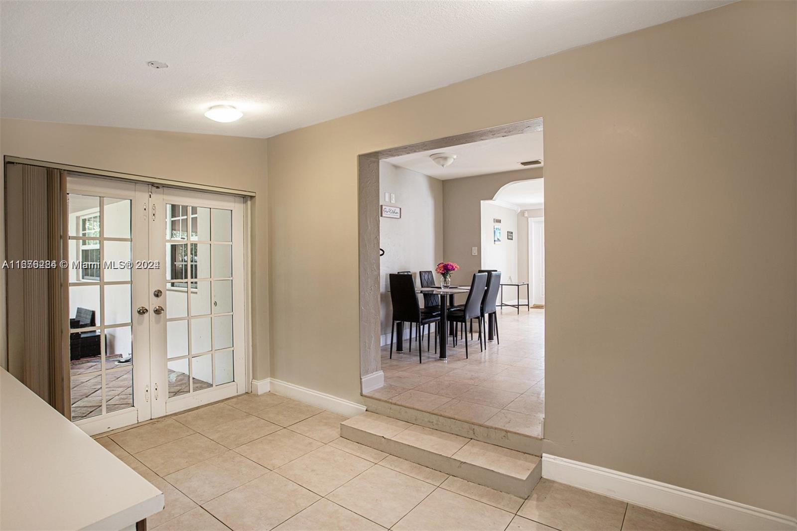 1531 Moffett Street Hollywood, FL 33020 - Photo 10 of 34 a view of a livingroom with furniture and entryway