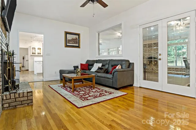 a view of livingroom with fireplace and window