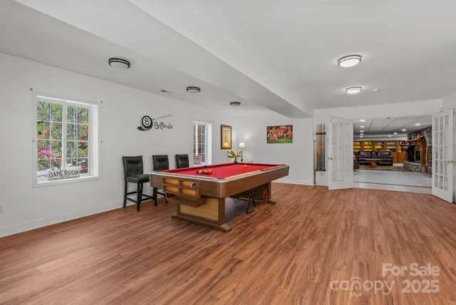 a kitchen with stainless steel appliances granite countertop a sink and cabinets