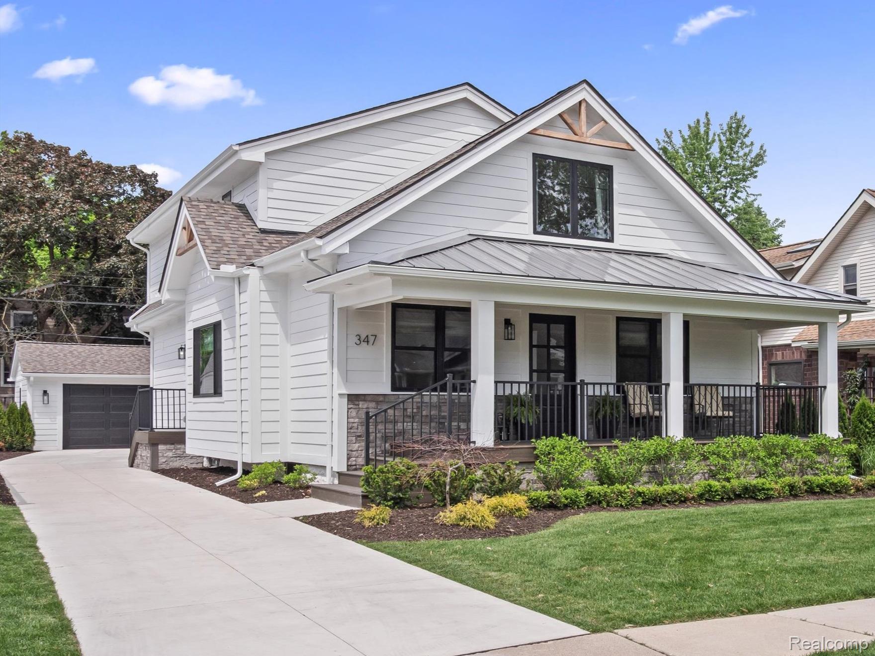 347 Highland Avenue Rochester, MI 48307 - Photo 1 of 59 Modern farmhouse-style home with white siding and dark trim