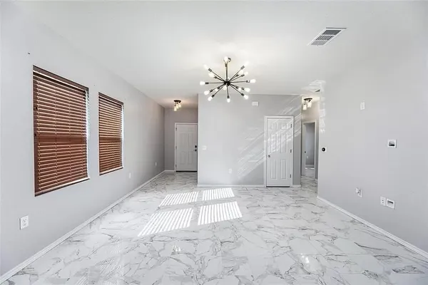 a view of a livingroom with a furniture