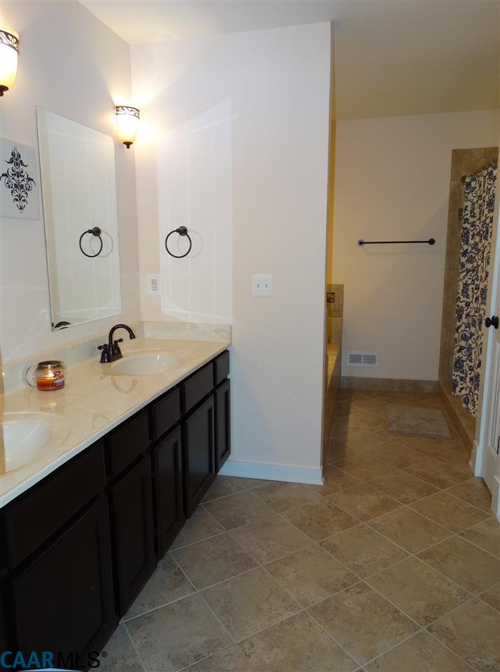 5331 Waterford Road Rixeyville, VA 22737 - Photo 20 of 36 a bathroom with a sink and a mirror
