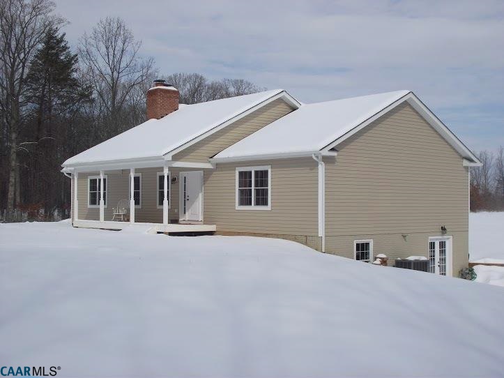 5331 Waterford Road Rixeyville, VA 22737 - Photo 2 of 36 a view of a house with a yard and garage