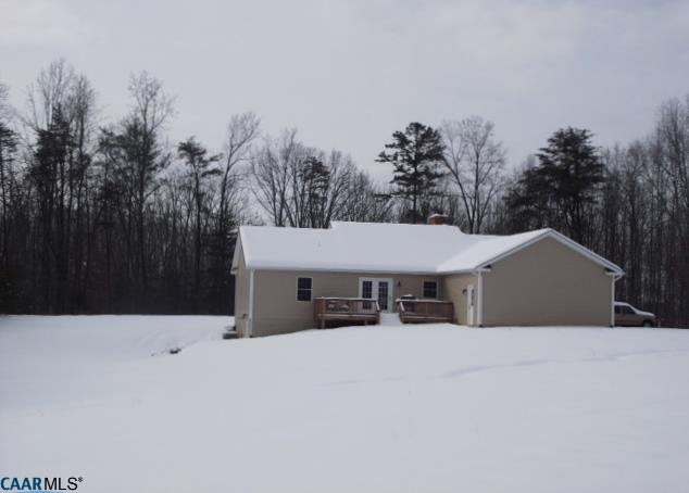 5331 Waterford Road Rixeyville, VA 22737 - Photo 5 of 36 a white house with trees in the background