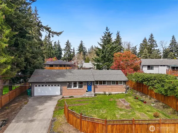 aerial view of a house with roof deck front of house
