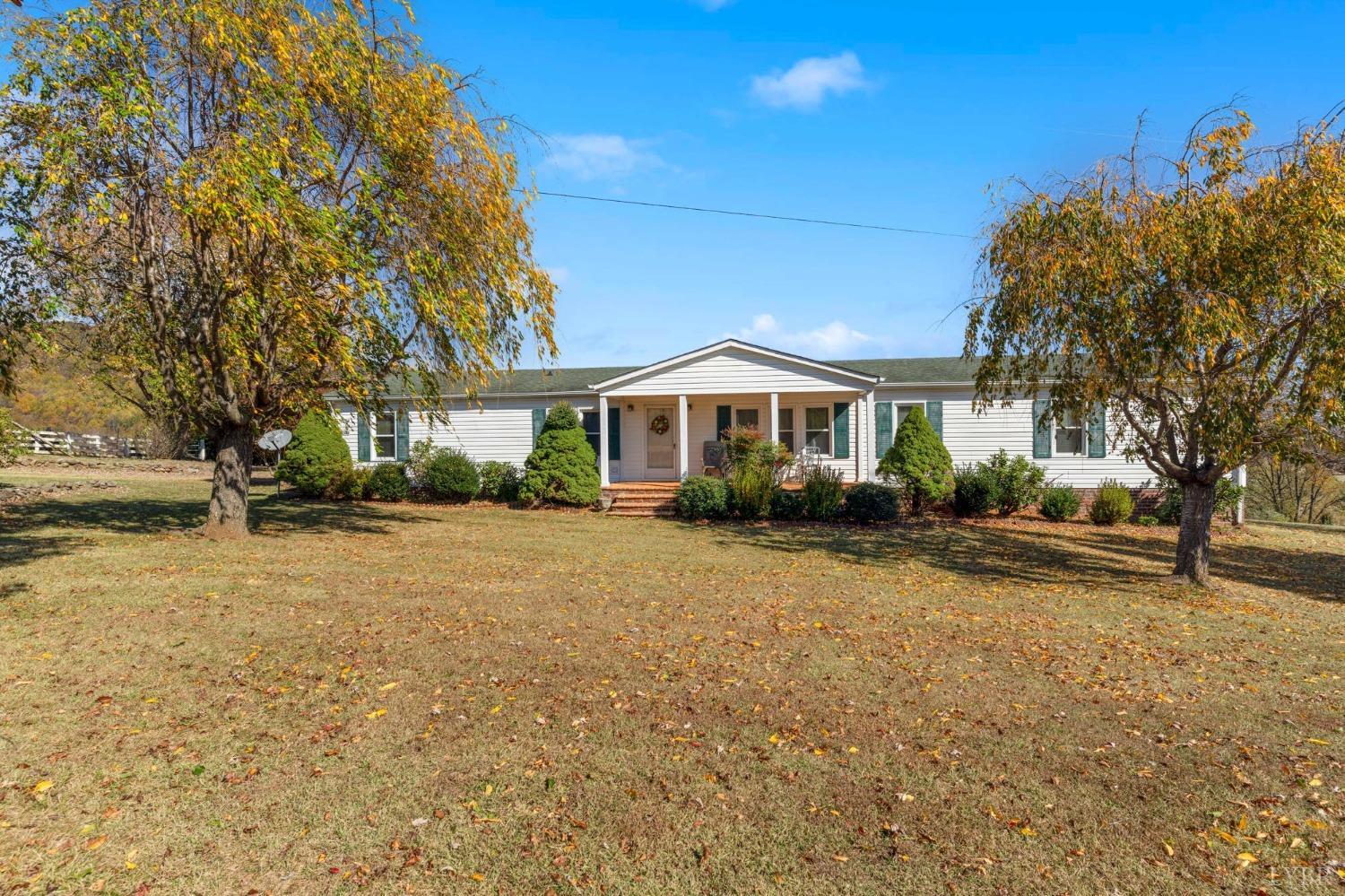 1328 Indian Creek Road Amherst, VA 24521 - Photo 1 of 51 a front view of a house with a yard