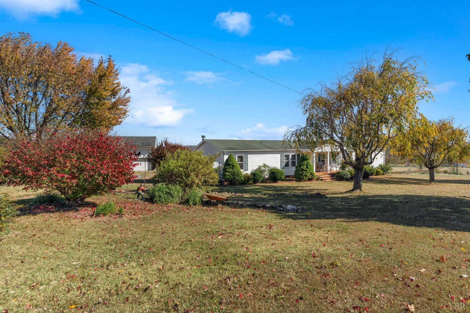 1328 Indian Creek Road Amherst, VA 24521 - Photo 34 of 51 a front view of a house with a yard