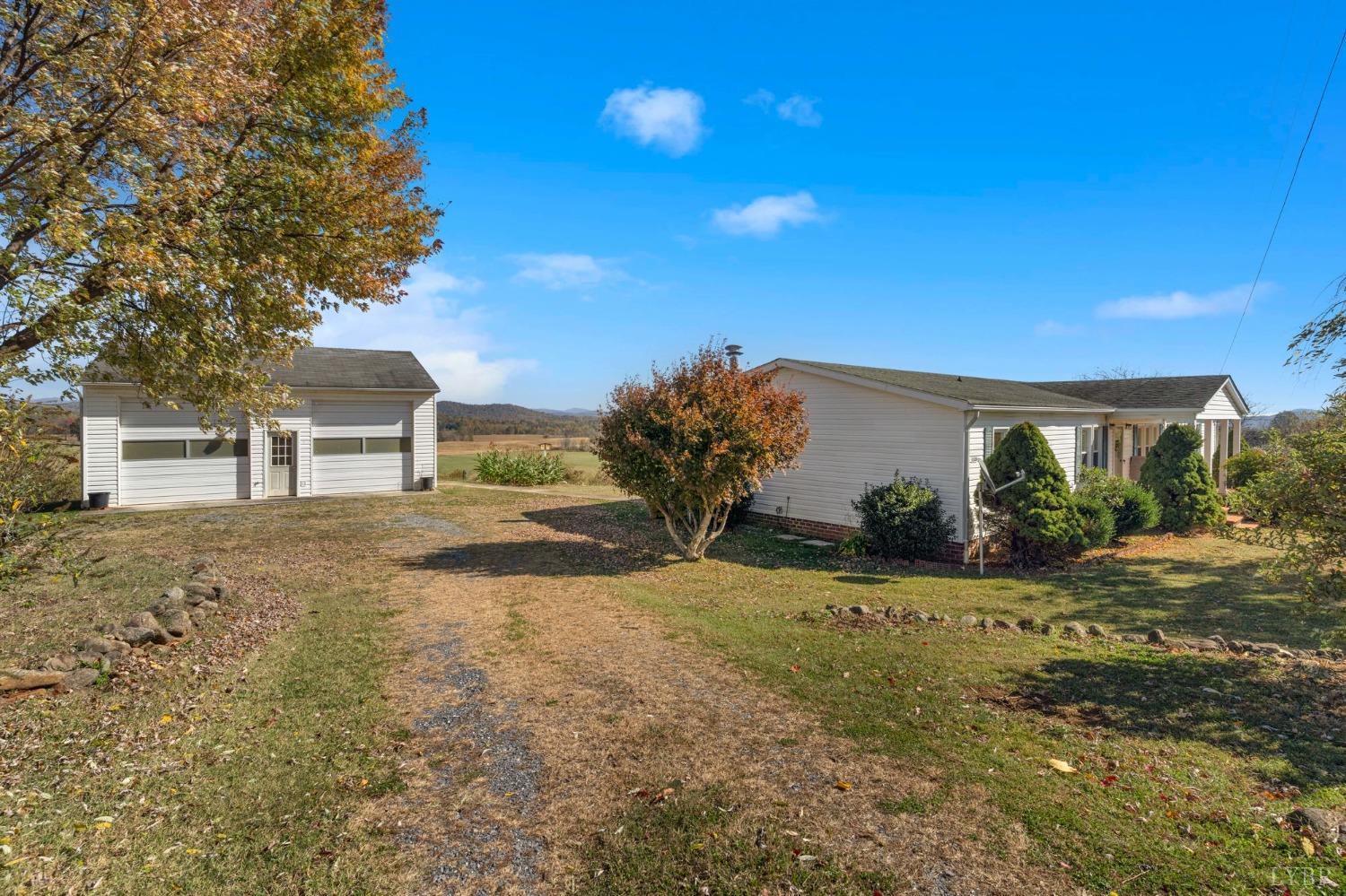 1328 Indian Creek Road Amherst, VA 24521 - Photo 35 of 51 a front view of a house with garden