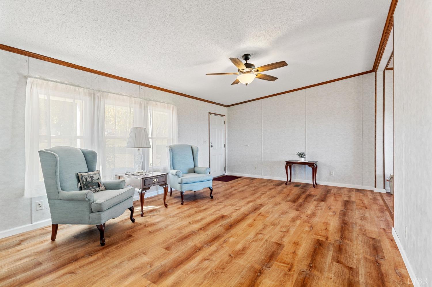 1328 Indian Creek Road Amherst, VA 24521 - Photo 7 of 51 a living room with furniture and a table