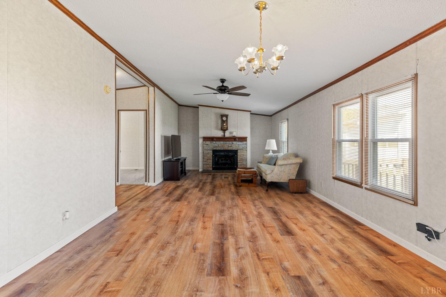 1328 Indian Creek Road Amherst, VA 24521 - Photo 10 of 51 a living room with furniture and a fireplace