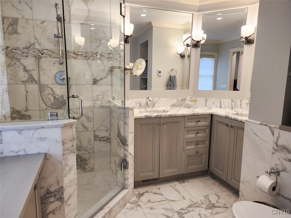 4840 Westfield Drive Manlius, NY 13104 - Photo 25 of 48 This incredible marble bathroom features convenien