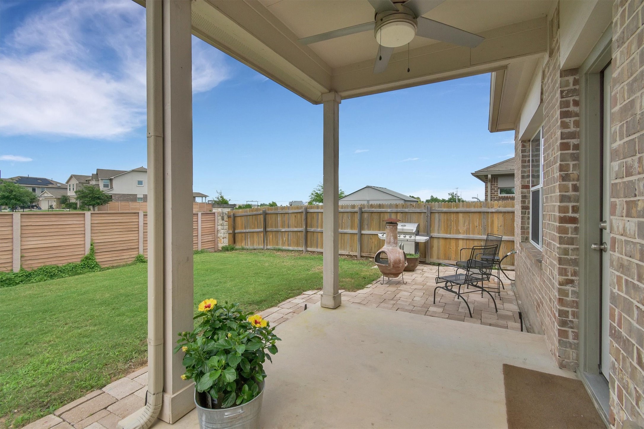 324 Shiner Lane Georgetown, TX 78626 - Photo 29 of 39 a view of a patio with couches chairs and a yard