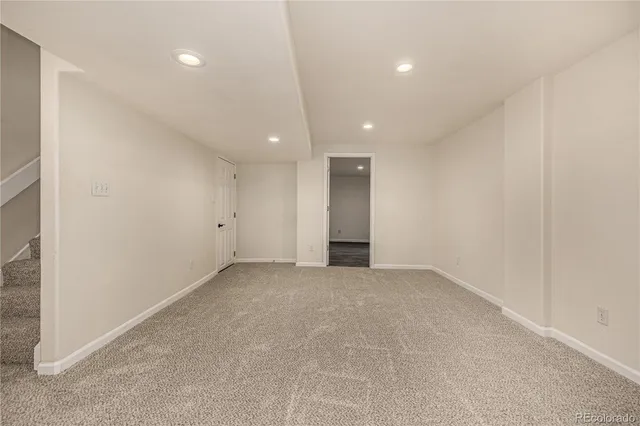 an empty room with an entryway