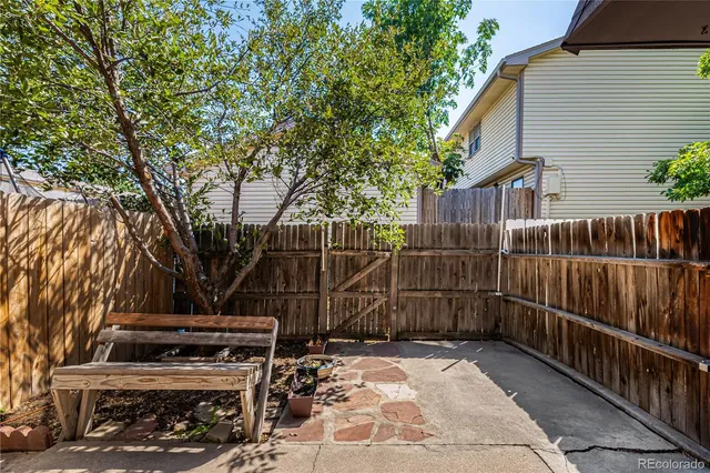 a view of a wooden deck with a bench