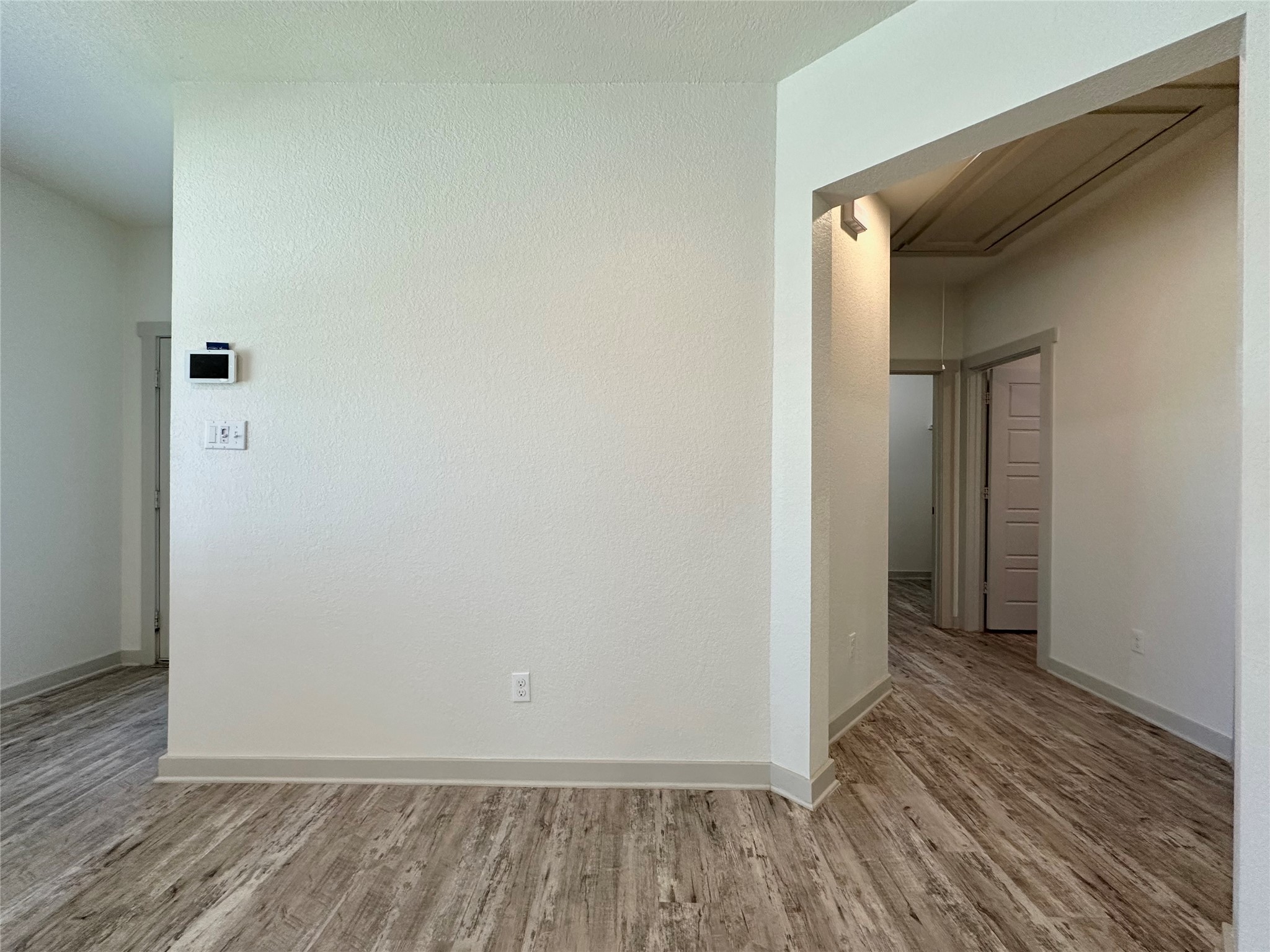 5132 Vanner Path Georgetown, TX 78626 - Photo 20 of 37 Unfurnished room with light wood finished floors and baseboards