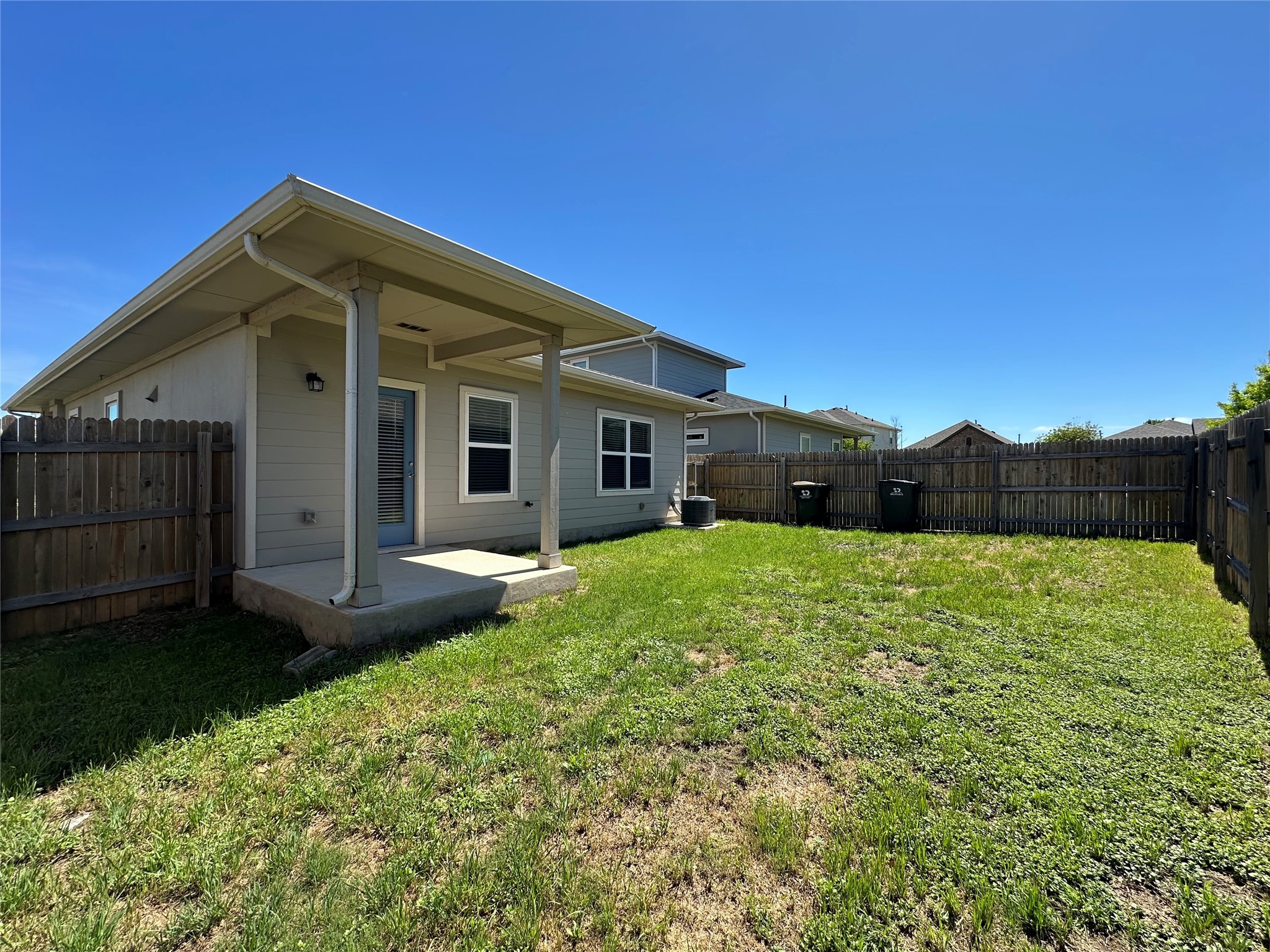 5132 Vanner Path Georgetown, TX 78626 - Photo 34 of 37 Back of property featuring a patio and a fenced backyard