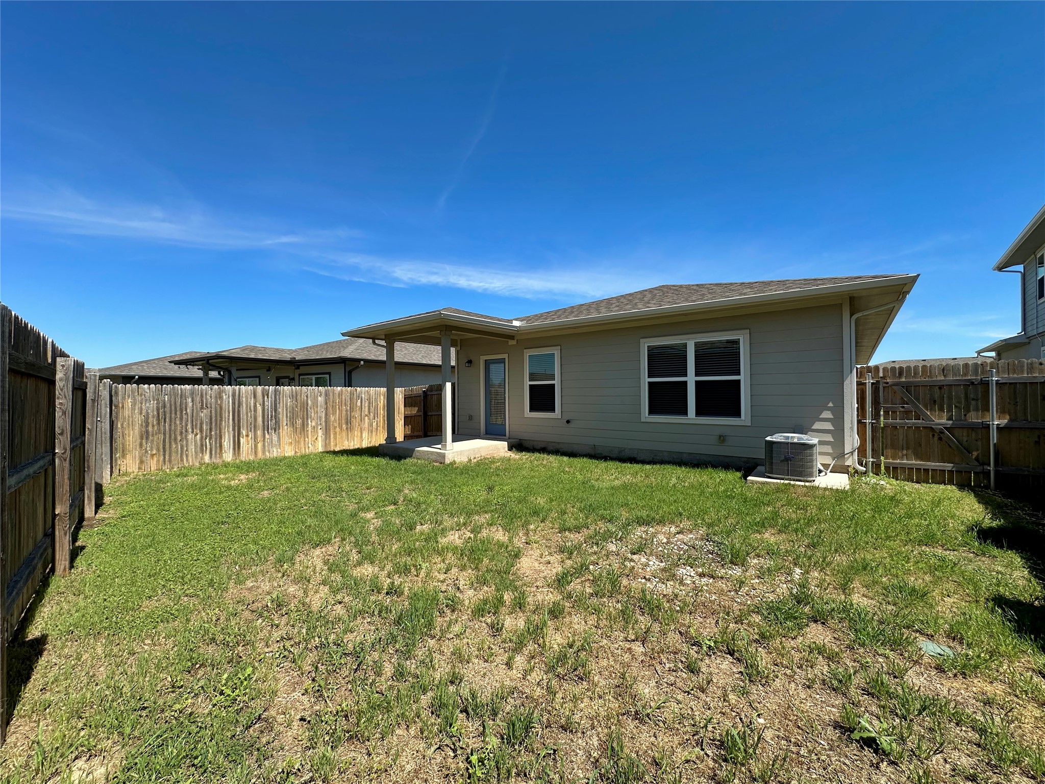 5132 Vanner Path Georgetown, TX 78626 - Photo 35 of 37 Back of house with a patio and a fenced backyard