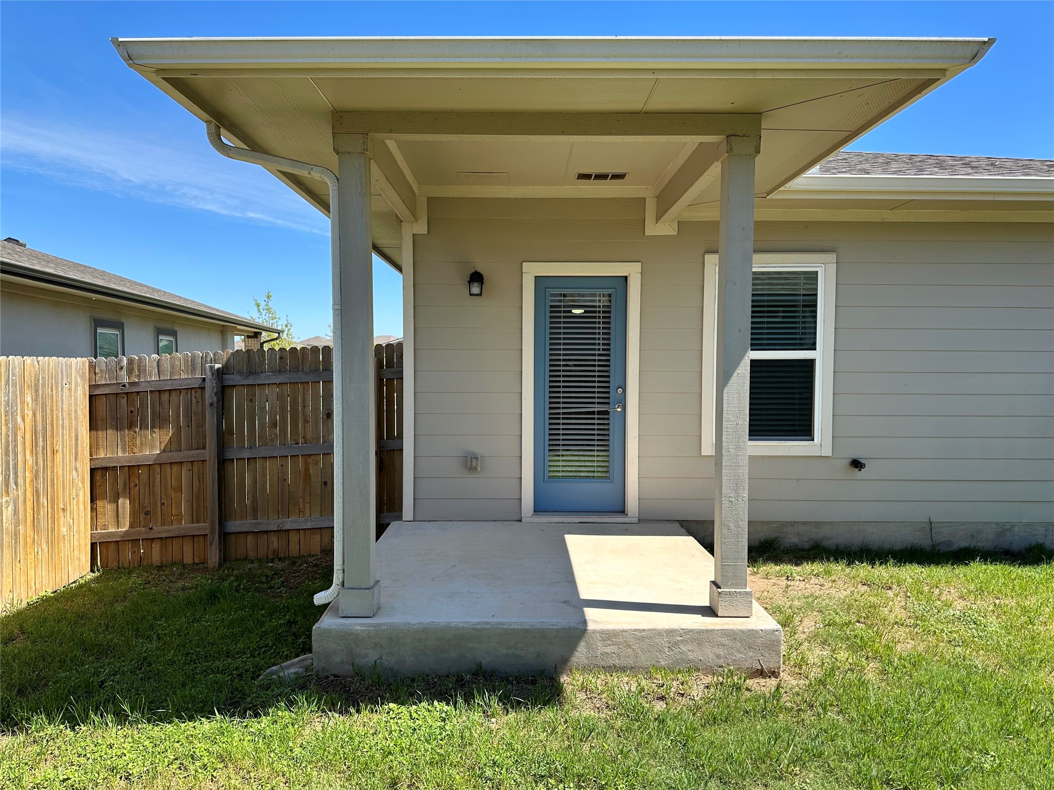 5132 Vanner Path Georgetown, TX 78626 - Photo 36 of 37 Back yard entrance to property featuring a patio