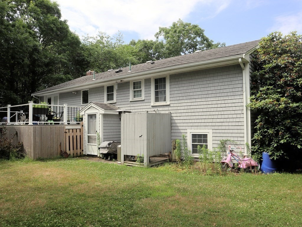 12 Tecumseh Road Bourne, MA 02562 - Photo 2 of 36 a view of a house with backyard