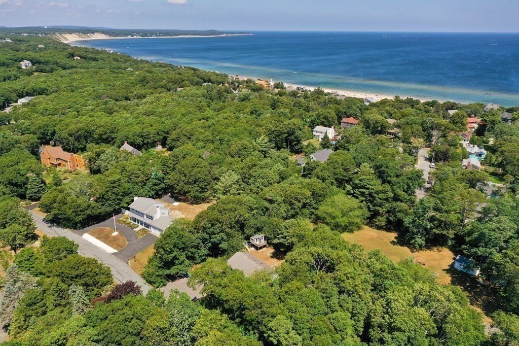 12 Tecumseh Road Bourne, MA 02562 - Photo 24 of 36 an aerial view of residential house with pool and trees all around