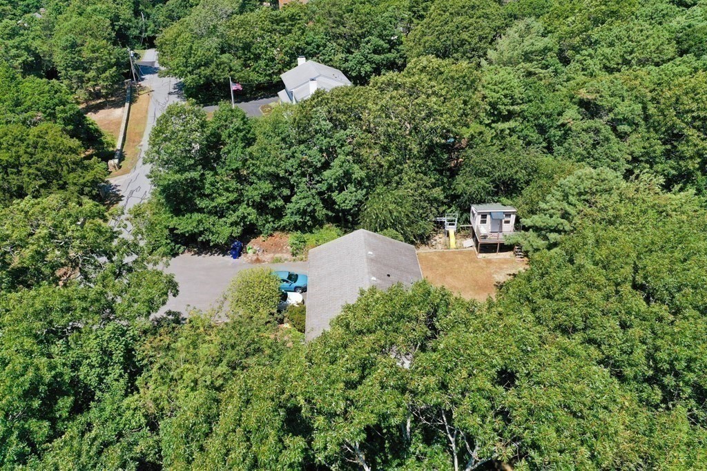 12 Tecumseh Road Bourne, MA 02562 - Photo 26 of 36 an aerial view of a house with yard and outdoor seating