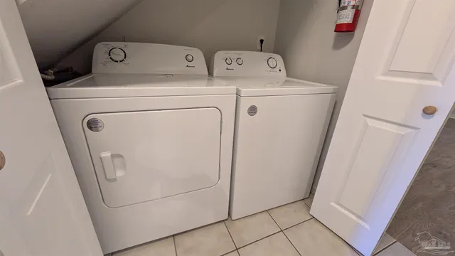 a kitchen with a sink a stove and refrigerator