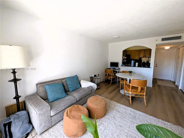 a kitchen with a stove and a microwave