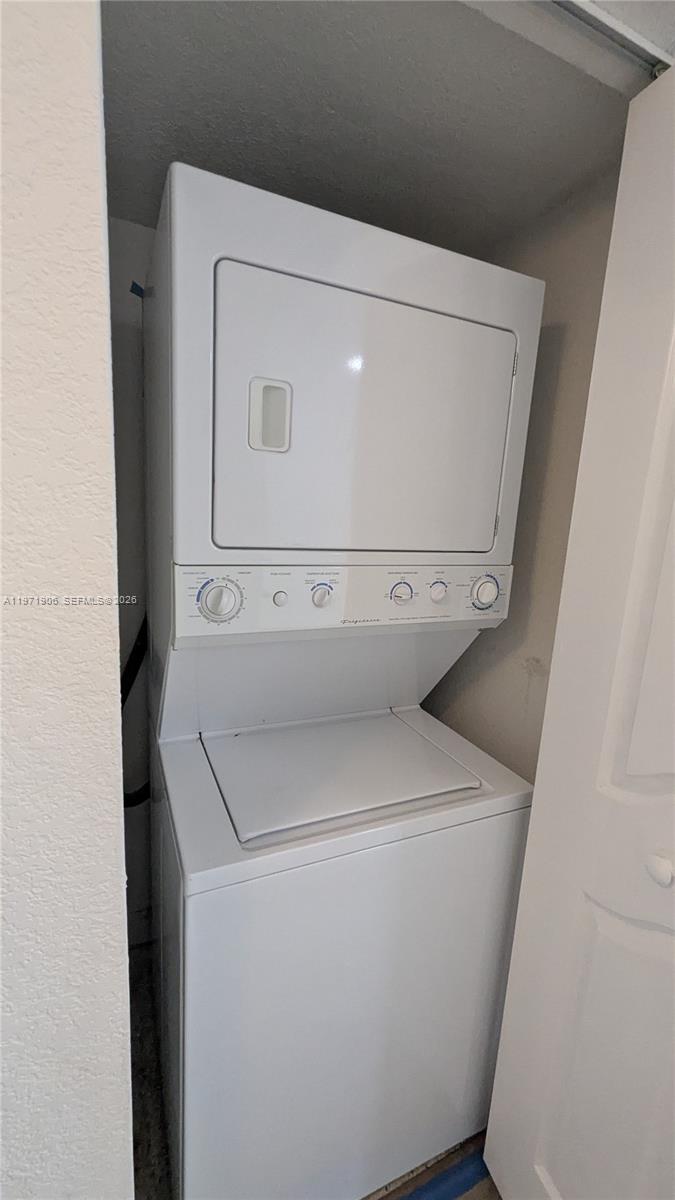 445 Southwest 11th Street, Unit 408 Miami, FL 33130 - Photo 19 of 29 a utility room with dryer and washer