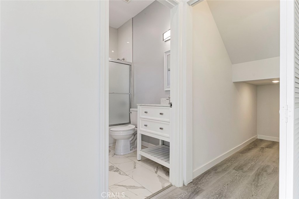 10499 Yolanda Avenue Porter Ranch, CA 91326 - Photo 13 of 37 a view of a bathroom with a toilet