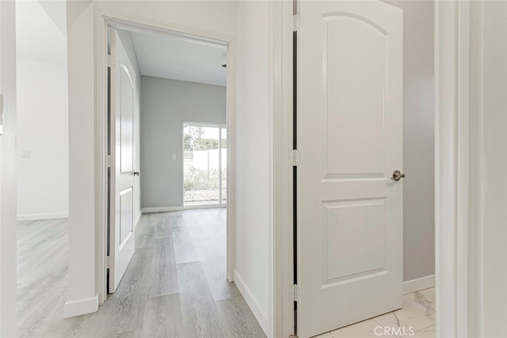 10499 Yolanda Avenue Porter Ranch, CA 91326 - Photo 16 of 37 a view of a hallway with wooden floor