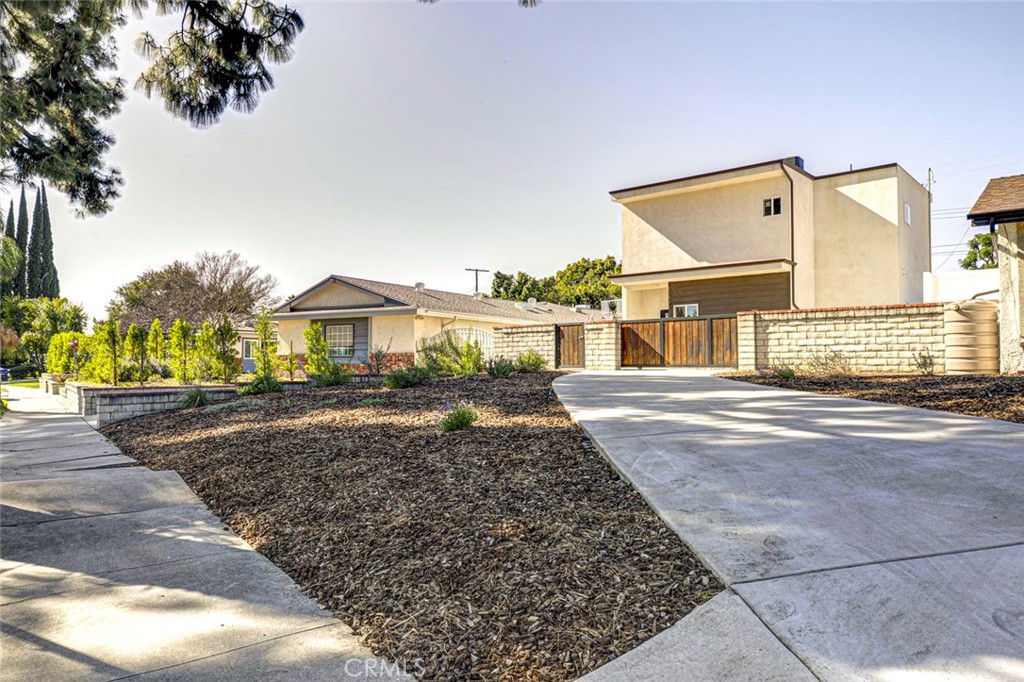 10499 Yolanda Avenue Porter Ranch, CA 91326 - Photo 2 of 37 a view of a house with a street