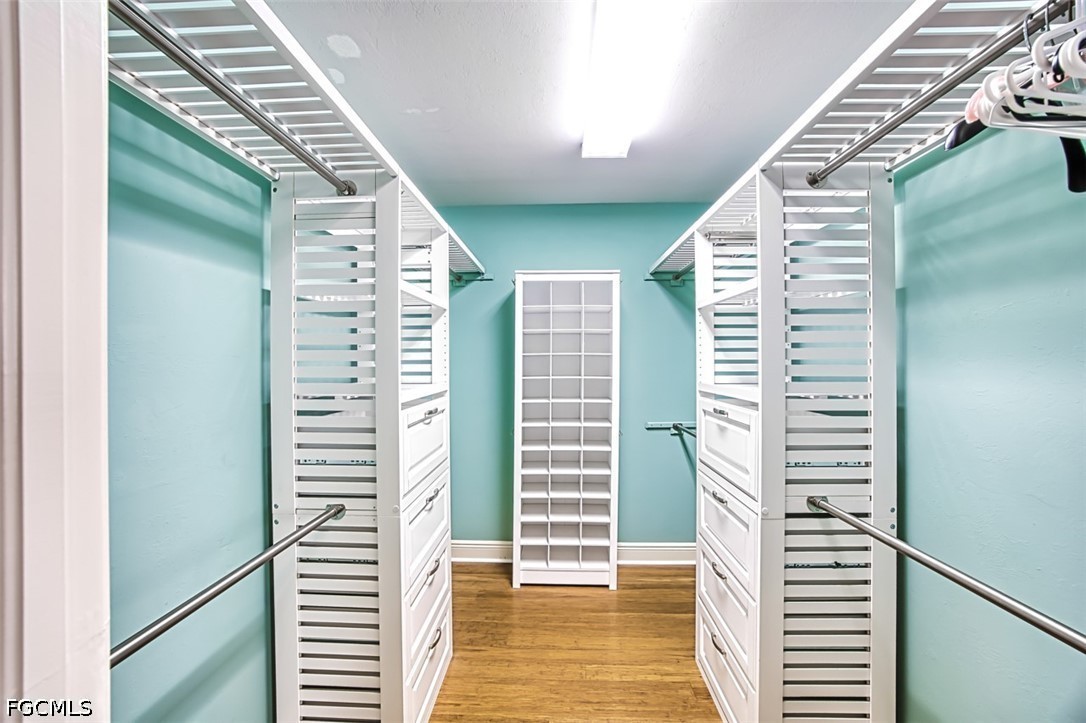2104 West First Street, Unit 1004 Fort Myers, FL 33901 - Photo 21 of 42 a view of a bedroom with stairs