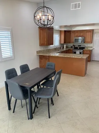 a view of a dining room with furniture