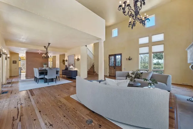 a bedroom with a bed closet and flat screen tv