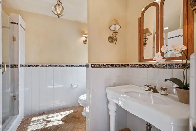 a view of a hallway with windows