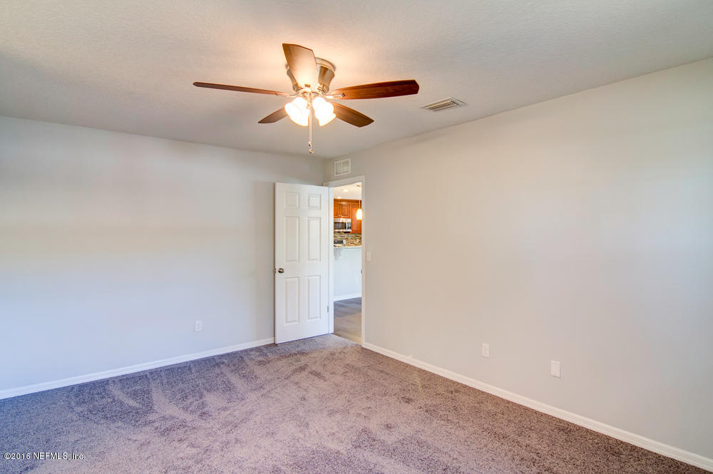 1634 Derringer Road Jacksonville, FL 32225 - Photo 33 of 41 a view of an empty room